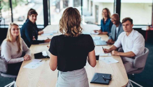 Businesswoman addressing a meeting in office