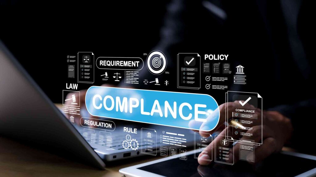 Businessman using digital tablet with virtual interface showing compliance, law, regulation, policy, and requirement. Corporate governance and data protection concept.